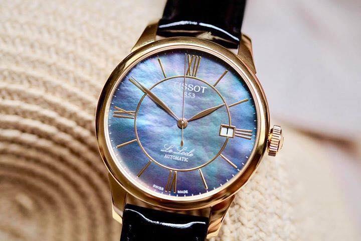 Đồng hồ mặt xà cừ